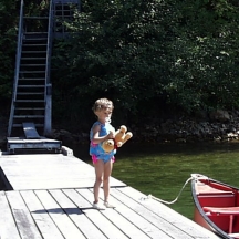 Brooke on dock with pooh .jpg (49004 bytes)